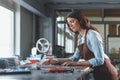 Young woman in workshop