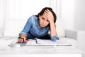 Young woman worried at home in stress accounting desperate in financial problems Royalty Free Stock Photo