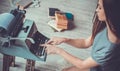 Young woman writer in library at home creative occupation typing article close-up Royalty Free Stock Photo