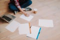 Young woman writing on blank sheet of paper Royalty Free Stock Photo