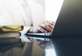 Young woman writing text hands on the open laptop in a cafe on a table with reflection, businesswoman working on computer Royalty Free Stock Photo