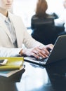 Young woman writing text hands on the open laptop in a cafe on a table with reflection , businesswoman working on computer Royalty Free Stock Photo