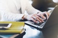 Young woman writing text hands on the open laptop in a cafe on a table with reflection, businesswoman working on computer Royalty Free Stock Photo