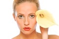 Young woman with yellow calla lily near face Royalty Free Stock Photo