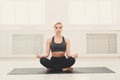 Young woman in yoga class, relax meditation pose Royalty Free Stock Photo