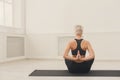 Young woman in yoga class, Reverse Prayer Pose Royalty Free Stock Photo