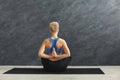 Young woman in yoga class, Reverse Prayer Pose Royalty Free Stock Photo