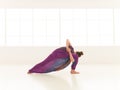 Young woman in yoga pose indor