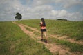 Young women active trail runners the top of a mountain in the afternoon, ultra marathon runners adventuring outdoors Royalty Free Stock Photo