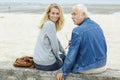 young woman on beach with father Royalty Free Stock Photo