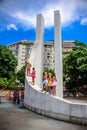 Young women in bright tutu skirts standing at the Memorial Getulio Vargas, Gloria neighborhood at Carnaval 2017