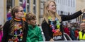 2019: Young women on a car and waving rainbow flags attending the Gay Pride parade also known as Christopher Street Day,Munich