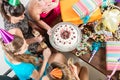 Young women celebrating with cake and champagne a birthday Royalty Free Stock Photo