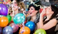 Young women celebrating German fasching Carnival at Rose Monday