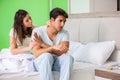 The young woman consoling disappointed impotent husband Royalty Free Stock Photo
