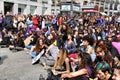 Young women demonstrating for International Women's Day