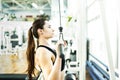 Young women doing pulldown exercise