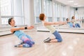 Young women doing workout in gym class indoors to loose weight Royalty Free Stock Photo
