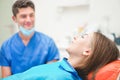 Young woman doing a x-ray for dental treatment inside professional dentist studio - People bodycare and stomatology concept for