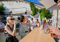 Young women drinking wine in outdoor bar Royalty Free Stock Photo