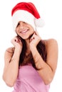 Young women embrassing wearing santa's hat Royalty Free Stock Photo