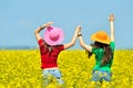 Young women on field in summer Royalty Free Stock Photo
