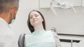 Young woman having dental checkup at the clinic