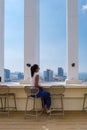 young women having a drink on a rooftop bar Royalty Free Stock Photo