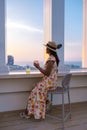 young women having a drink on a rooftop bar Royalty Free Stock Photo