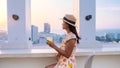 young women having a drink on a rooftop bar Royalty Free Stock Photo