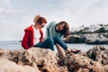 Young women are having fun on the green park in the evening. Royalty Free Stock Photo