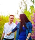 Young woman holding man`s hand Royalty Free Stock Photo