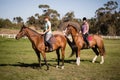 Young Women horseback riding