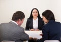 Young woman during job interview and members of managemen. Royalty Free Stock Photo