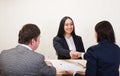 Young woman during job interview and members of managemen. Royalty Free Stock Photo