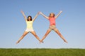 Young women jumping in air