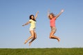 Young women jumping in air