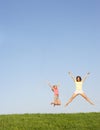 Young women jumping in air