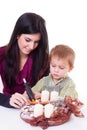 Young women with a little boy made advent wreath Royalty Free Stock Photo