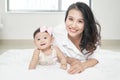 Young woman and little girl having fun in floor Royalty Free Stock Photo