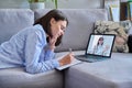 Young woman making video call with doctor, online meet at home Royalty Free Stock Photo