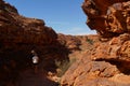 young women and man hiking into the Kings Canyon, Watarrka National Park, Northern Territory, Australia Royalty Free Stock Photo