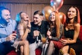 Young clubbers spend time in karaoke bar