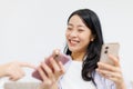 Young  women with mobile phones chatting at home Royalty Free Stock Photo