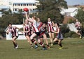 Young women play Australian Rules Football