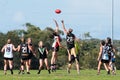 Young women playing Australian Rules Football