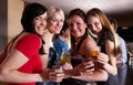 Young women posing at party