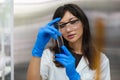 Young women scientist are working research and test chemical with test tubes in laboratory. student medical science experimenting Royalty Free Stock Photo