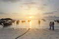 Young women see sunrise and relax on the beach ,Silhouette of l