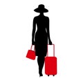 The Young women silhouette, walking with the red suitcase. Stylish chic lady in a hat. Travel luggage vacation trip Royalty Free Stock Photo